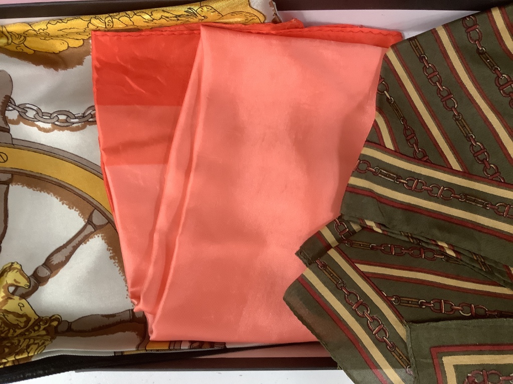 A collection of assorted late 20th century designer's silk scarves